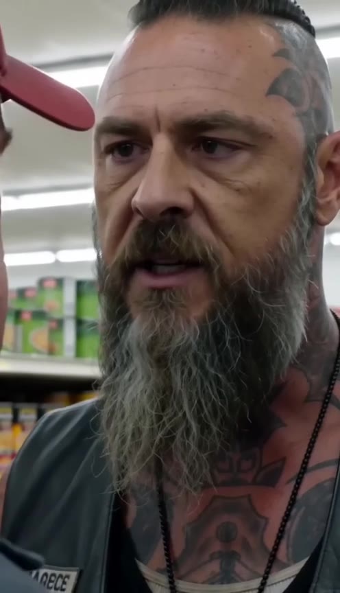 A Tough Biker Shields a Terrified Little Girl From an Angry Father in a Supermarket