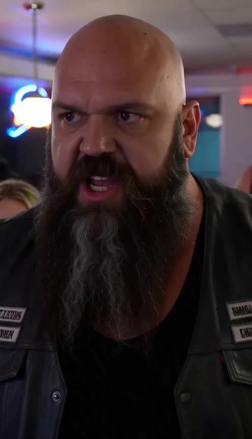 Why a Giant Biker Risked Everything to Protect a Terrified Stranger in a Diner