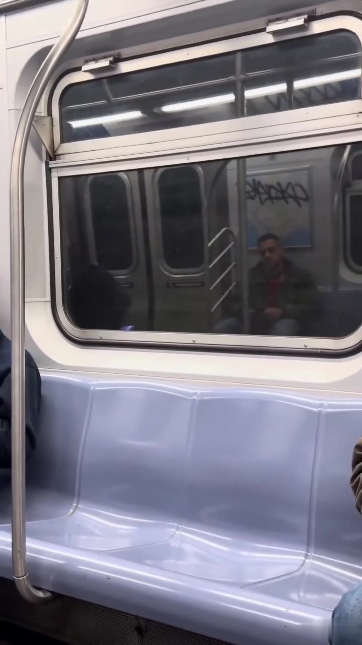 An Elegant Woman Shamed Me on a Crowded Subway—Then I Pulled Down My Hood
